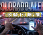 A viral, hyper-realistic YouTube thumbnail with a high-alert law enforcement atmosphere. The background is a blurred Colorado highway at dusk with emergency lights creating red and blue lens flares across the scene with dramatic cinematic lighting. The composition uses a low angle to focus on the main subject: a detailed steering wheel with one hand holding it while the other hand is suspended mid-air reaching toward a glowing smartphone on the dashboard, creating tension. Image size should be 3:2. The image features massive 3D typography with strict hierarchy: The Primary Text reads exactly: 'COLORADO ALERT'. This text is massive, the largest element in the frame, rendered in Police Badge Chrome with emergency light reflections to look like a high-budget 3D render. The Secondary Text reads exactly: 'DISTRACTED DRIVING'. This text is significantly smaller, positioned below the main text. It features a thick, distinct bright yellow border/outline (sticker style) with hazard stripe texture to contrast against the background. Make sure text 2 is always different theme, style, effect and border compared to text 1. The text materials correspond to the story's concept. Crucial Instruction: There is absolutely NO other text, numbers, watermarks, or subtitles in this image other than these two specific lines. 8k, Unreal Engine 5, cinematic render.