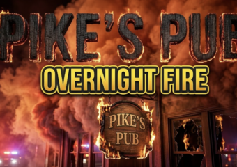 A viral, hyper-realistic YouTube thumbnail with a dramatic emergency atmosphere. The background is a nighttime commercial building exterior with billowing smoke clouds illuminated by red and orange emergency lights, creating an intense amber glow against the dark sky. The composition uses a low angle shot to focus on the main subject: a weathered wooden pub sign with flames licking at its edges, emergency vehicle lights reflecting off broken windows in the background. Image size should be 3:2. The image features massive 3D typography with strict hierarchy: The Primary Text reads exactly: 'PIKE'S PUB'. This text is massive, the largest element in the frame, rendered in charred wood texture with glowing ember edges to look like a high-budget 3D render. The Secondary Text reads exactly: 'OVERNIGHT FIRE'. This text is significantly smaller, positioned below the main text. It features a thick, distinct yellow and black border outline in bold sans-serif style to contrast against the smoky background. Make sure text 2 is always different theme, style, effect and border compared to text 1. The text materials correspond to the story's concept. Crucial Instruction: There is absolutely NO other text, numbers, watermarks, or subtitles in this image other than these two specific lines. 8k, Unreal Engine 5, cinematic render.