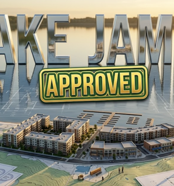 A viral, hyper-realistic YouTube thumbnail with a lakeside development atmosphere. The background is a serene lakefront scene with modern architectural blueprints overlaying a natural Indiana lake setting, featuring golden hour lighting reflecting off calm water. The composition uses a wide-angle aerial view to focus on the main subject: a detailed 3D architectural model of mixed-use buildings positioned on a topographic map of Lake James shoreline, with miniature construction elements and planning documents visible. Image size should be 3:2. The image features massive 3D typography with strict hierarchy: The Primary Text reads exactly: 'LAKE JAMES'. This text is massive, the largest element in the frame, rendered in polished chrome with water reflection effects to look like a high-budget 3D render. The Secondary Text reads exactly: 'APPROVED'. This text is significantly smaller, positioned below the main text. It features a thick, distinct green and gold border/outline (sticker style) with a stamped approval seal effect to contrast against the background. Make sure text 2 is always different theme, style, effect and border compared to text 1. The text materials correspond to the story's concept. Crucial Instruction: There is absolutely NO other text, numbers, watermarks, or subtitles in this image other than these two specific lines. 8k, Unreal Engine 5, cinematic render