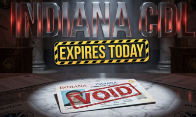 A viral, hyper-realistic YouTube thumbnail with a tense governmental atmosphere. The background is a dimly lit Indiana government building interior with dramatic spotlighting cutting through shadows and official state seals visible. The composition uses a low angle shot to focus on the main subject: a realistic Indiana commercial driver's license card lying on a polished marble desk, half-covered by an official VOID stamp, with blurred immigration documents scattered around it. Image size should be 3:2. The image features massive 3D typography with strict hierarchy: The Primary Text reads exactly: 'INDIANA CDL'. This text is massive, the largest element in the frame, rendered in metallic chrome with red alert lighting reflections to look like a high-budget 3D render. The Secondary Text reads exactly: 'EXPIRES TODAY'. This text is significantly smaller, positioned below the main text. It features a thick, distinct yellow and black hazard stripe border/outline in a bold sticker style to contrast against the background. Make sure text 2 is always different theme, style, effect and border compared to text 1. The text materials correspond to the story's concept. Crucial Instruction: There is absolutely NO other text, numbers, watermarks, or subtitles in this image other than these two specific lines. 8k, Unreal Engine 5, cinematic render