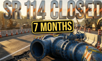 A viral, hyper-realistic YouTube thumbnail with an industrial infrastructure atmosphere. The background is a busy Indiana highway construction zone at golden hour with orange traffic cones lining both sides, heavy machinery visible in soft focus, and dramatic side lighting casting long shadows across asphalt. The composition uses a low angle shot to focus on the main subject: a massive blue water main pipe section resting on the roadside with visible valve connections and industrial bolts, surrounded by construction barriers and warning signs. Image size should be 3:2. The image features massive 3D typography with strict hierarchy: The Primary Text reads exactly: 'SR 114 CLOSED'. This text is massive, the largest element in the frame, rendered in reflective chrome metal with orange safety stripe accents to look like a high-budget 3D render with dramatic lighting reflections. The Secondary Text reads exactly: '7 MONTHS'. This text is significantly smaller, positioned below the main text. It features a thick, distinct bright yellow border with black outline in sticker style to contrast against the background. Make sure text 2 is always different theme, style, effect and border compared to text 1. The text materials correspond to the story's concept. Crucial Instruction: There is absolutely NO other text, numbers, watermarks, or subtitles in this image other than these two specific lines. 8k, Unreal Engine 5, cinematic render