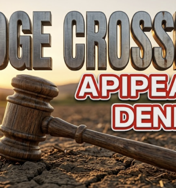 A viral, hyper-realistic YouTube thumbnail with a Earthy/Sunset atmosphere. The background is a detailed rustic Colorado farming field at dusk with warm golden hour lighting. The composition uses a Macro focus to focus on the main subject: a detailed rustic wooden judge gavel resting on dry farming soil. Image size should be 3:2. The image features massive 3D typography with strict hierarchy: The Primary Text reads exactly: 'RIDGE CROSSING'. This text is massive, the largest element in the frame, rendered in weathered brushed steel to look like a high-budget 3D render. The Secondary Text reads exactly: 'APPEAL DENIED'. This text is significantly smaller, positioned below or next to the main text. It features a thick, distinct crimson red border/outline (sticker style) to contrast against the background. Make sure text 2 is always different theme, style, effect and border compared to text 1. The text materials correspond to the story's concept. Crucial Instruction: There is absolutely NO other text, numbers, watermarks, or subtitles in this image other than these two specific lines. 8k, Unreal Engine 5, cinematic render