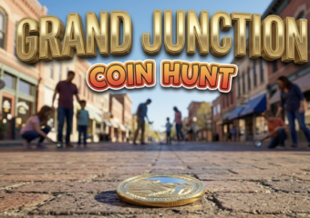A viral, hyper-realistic YouTube thumbnail with a vibrant spring community event atmosphere. The background is a bustling downtown street scene with brick buildings, shop fronts, and clear blue Colorado skies with warm afternoon lighting. The composition uses a low angle shot to focus on the main subject: a gleaming golden commemorative coin resting on vintage brick pavement, with blurred silhouettes of families searching in the background. Image size should be 3:2. The image features massive 3D typography with strict hierarchy: The Primary Text reads exactly: 'GRAND JUNCTION'. This text is massive, the largest element in the frame, rendered in polished gold metallic material with engraved texture to look like a high-budget 3D render. The Secondary Text reads exactly: 'COIN HUNT'. This text is significantly smaller, positioned below the main text. It features a thick, distinct orange and red gradient border/outline (sticker style) with a playful adventure font to contrast against the background. Make sure text 2 is always different theme, style, effect and border compared to text 1. The text materials correspond to the story's concept. Crucial Instruction: There is absolutely NO other text, numbers, watermarks, or subtitles in this image other than these two specific lines. 8k, Unreal Engine 5, cinematic render.