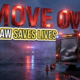 A viral, hyper-realistic YouTube thumbnail with a dramatic emergency scene atmosphere. The background is a dark highway at dusk with red and blue emergency lights reflecting off wet asphalt and swirling fog with cinematic lighting creating urgency. The composition uses a low angle shot to focus on the main subject: a damaged fire truck's side compartment with a crushed roll-up door, emergency cones scattered on the ground, and warning lights still flashing. Image size should be 3:2. The image features massive 3D typography with strict hierarchy: The Primary Text reads exactly: 'MOVE OVER'. This text is massive, the largest element in the frame, rendered in bright emergency red chrome with pulsating warning light effects to look like a high-budget 3D render. The Secondary Text reads exactly: 'LAW SAVES LIVES'. This text is significantly smaller, positioned below the main text. It features a thick, distinct white and yellow border outline in sticker style to contrast against the background. Make sure text 2 is always different theme, style, effect and border compared to text 1. The text materials correspond to the story's concept. Crucial Instruction: There is absolutely NO other text, numbers, watermarks, or subtitles in this image other than these two specific lines. 8k, Unreal Engine 5, cinematic render.