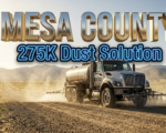 A viral, hyper-realistic YouTube thumbnail with a professional municipal infrastructure atmosphere. The background is a dusty Colorado dirt road stretching toward distant mountains with golden afternoon sunlight and swirling dust particles suspended in the air. The composition uses a low-angle camera perspective to focus on the main subject: a large metal road treatment tanker truck with magnesium chloride spraying equipment visible. The image features massive 3D typography with strict hierarchy: The Primary Text reads exactly: "MESA COUNTY". This text is massive, the largest element in the frame, rendered in shimmering chrome and metallic gold material to look like a high-budget 3D render with real-time reflections. The Secondary Text reads exactly: "275K Dust Solution". This text is significantly smaller, positioned below the primary text, featuring a thick bright blue neon border with a sticker-style outline that contrasts sharply against the dusty background. The text materials correspond to the professional infrastructure concept. Crucial Instruction: There is absolutely no other text, numbers, watermarks, or subtitles in this image other than these two specific lines. 8k, Unreal Engine 5, cinematic render.