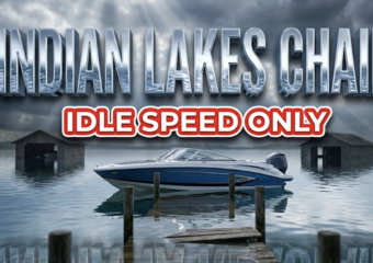 A viral, hyper-realistic YouTube thumbnail with a cautionary outdoor atmosphere. The background is a serene northern Indiana lake with crystal-clear water lapping dangerously high against wooden docks and boathouses, featuring dramatic overcast spring skies with volumetric god rays breaking through storm clouds. The composition uses a Low Angle shot from water level to emphasize the rising water threat, focusing on the main subject: a sleek modern motorboat floating completely still on glassy water with a vintage wooden dock partially submerged in the background. Image size should be 3:2. The image features massive 3D typography with strict hierarchy: The Primary Text reads exactly: 'INDIAN LAKES CHAIN'. This text is massive, the largest element in the frame, rendered in Liquid Chrome with rippling water reflection effects to look like a high-budget 3D render. The Secondary Text reads exactly: 'IDLE SPEED ONLY'. This text is significantly smaller, positioned below the main text. It features a thick, distinct red and white border/outline (sticker style) with bold warning tape aesthetic to contrast against the background. Make sure text 2 is always different theme, style, effect and border compared to text 1. The text materials correspond to the story's concept. Crucial Instruction: There is absolutely NO other text, numbers, watermarks, or subtitles in this image other than these two specific lines. 8k, Unreal Engine 5, cinematic render.