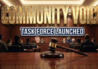 A viral, hyper-realistic YouTube thumbnail with a civic engagement atmosphere. The background is a modern town hall meeting room in Fort Wayne with warm spotlights illuminating wooden podiums and seated silhouettes (no faces visible), captured with dramatic depth of field. The composition uses a low angle shot to focus on the main subject: an elegant wooden gavel resting on a polished mahogany surface with the American flag softly blurred in the background. Image size should be 3:2. The image features massive 3D typography with strict hierarchy: The Primary Text reads exactly: 'COMMUNITY VOICE'. This text is massive, the largest element in the frame, rendered in polished gold with embossed patriotic star patterns to look like a high-budget 3D render with subtle glow effects. The Secondary Text reads exactly: 'TASK FORCE LAUNCHED'. This text is significantly smaller, positioned below the main text. It features a thick, distinct navy blue border with white outline (sticker style) in clean sans-serif font to contrast against the background. Make sure text 2 is always different theme, style, effect and border compared to text 1. The text materials correspond to the story's concept. Crucial Instruction: There is absolutely NO other text, numbers, watermarks, or subtitles in this image other than these two specific lines. 8k, Unreal Engine 5, cinematic render.