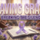 A viral, hyper-realistic YouTube thumbnail with a compassionate, hopeful atmosphere. The background is a softly lit community center interior with warm amber lighting streaming through large windows, creating gentle bokeh effects. The composition uses a Low Angle shot to focus on the main subject: a pristine lavender ribbon elegantly draped over an open notebook with a pen resting beside it, symbolizing advocacy and voice, surrounded by soft purple flowers and supportive hands reaching toward the center without showing faces. Image size should be 3:2. The image features massive 3D typography with strict hierarchy: The Primary Text reads exactly: 'SAVING GRACE'. This text is massive, the largest element in the frame, rendered in Soft Lavender Gradient with Gold Highlights to look like a high-budget 3D render with gentle glow effects. The Secondary Text reads exactly: 'BREAKING THE SILENCE'. This text is significantly smaller, positioned below the main text. It features a thick, distinct white and deep purple border/outline in sticker style to contrast against the background. Make sure text 2 is always different theme, style, effect and border compared to text 1. The text materials correspond to the story's concept of hope and healing. Crucial Instruction: There is absolutely NO other text, numbers, watermarks, or subtitles in this image other than these two specific lines. 8k, Unreal Engine 5, cinematic render.