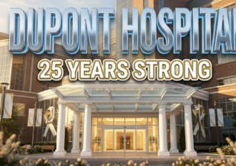 A viral, hyper-realistic YouTube thumbnail with a Healthcare Excellence atmosphere. The background is a modern hospital exterior with warm golden hour lighting cascading across glass windows and brick facade, creating an inspiring and trustworthy mood with soft bokeh effects in the foreground. The composition uses a Low Angle shot to focus on the main subject: a grand illuminated hospital entrance with pristine white columns, automatic doors reflecting warm interior light, and manicured landscaping with subtle anniversary celebration elements like elegant banners. Image size should be 3:2. The image features massive 3D typography with strict hierarchy: The Primary Text reads exactly: 'DUPONT HOSPITAL'. This text is massive, the largest element in the frame, rendered in Premium Medical Chrome with soft blue accent lighting to look like a high-budget 3D render with clean, professional aesthetic. The Secondary Text reads exactly: '25 YEARS STRONG'. This text is significantly smaller, positioned below the main text. It features a thick, distinct gold border with white fill (sticker style) to contrast against the background with a celebration ribbon effect. Make sure text 2 is always different theme, style, effect and border compared to text 1. The text materials correspond to the story's medical milestone concept. Crucial Instruction: There is absolutely NO other text, numbers, watermarks, or subtitles in this image other than these two specific lines. 8k, Unreal Engine 5, cinematic render.
