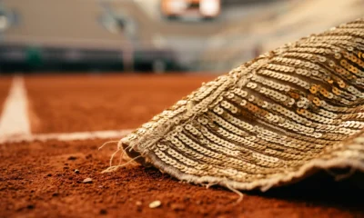 Naomi Osaka French Open gold sequined Eiffel Tower dress at Roland Garros.