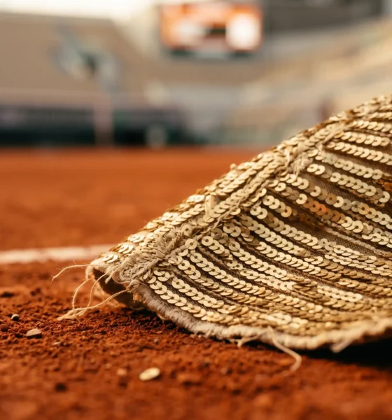 Naomi Osaka French Open gold sequined Eiffel Tower dress at Roland Garros.