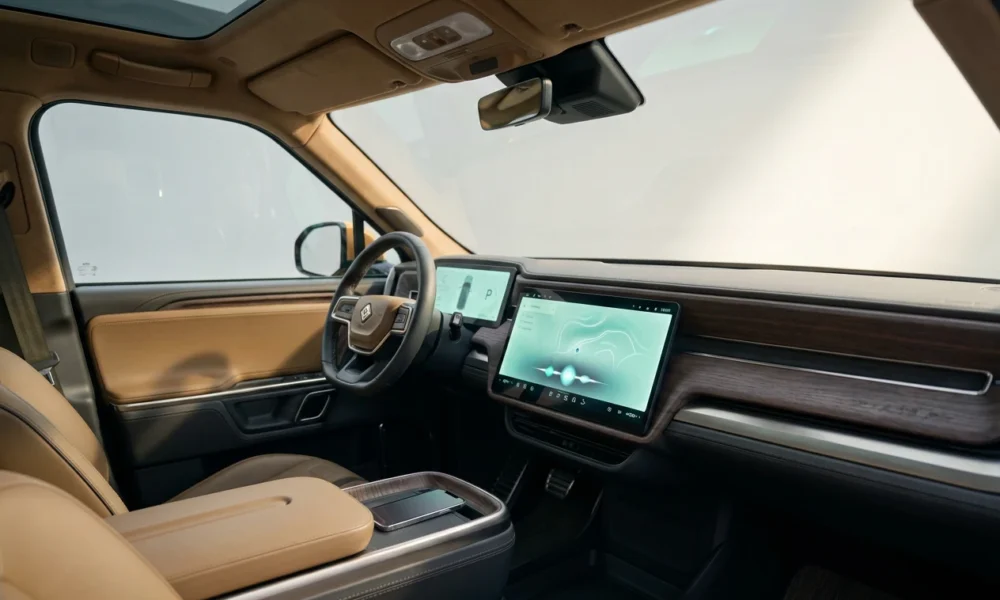 Rivian R1S interior display showing native infotainment without Apple CarPlay support.