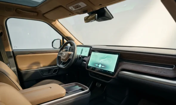 Rivian R1S interior display showing native infotainment without Apple CarPlay support.
