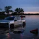 Tesla Cybertruck wade mode failure at Grapevine Lake after Texas driver's arrest.