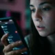 AI music detector scanning streaming playlists on phone