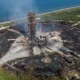 Blue Origin New Glenn explosion damage at LC-36 launch pad visible from space.