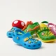 Crocs x Super Mario collection clogs and Jibbitz charms releasing July 15.