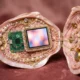 DIY cyberdeck trend shown as a pink seashell purse computer with an exposed board.