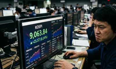 Fed dot plot flags 2026 rate hike as Kospi crosses 9000
